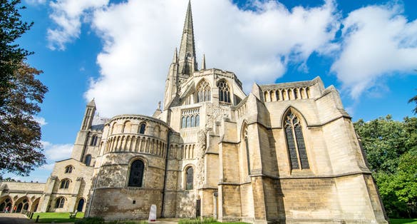 Photo of most famous place in Norwich, The Norwich Cathedral on a sunny day at Nowich, Norfolk, England.