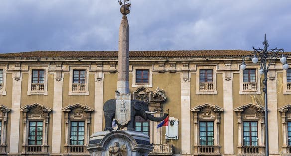 photo of view of Elephant Fountain in front of Elephant palace (City Hall) in Catania, Sicily, Catania, Italy.