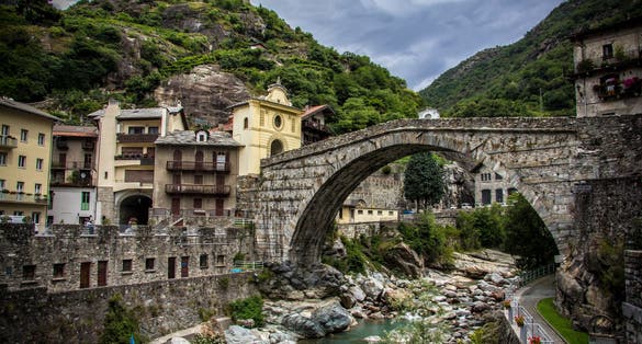 Ancient roman bridge over torrent Lys in Pont Saint Martin, Italy