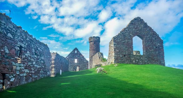 Landscape view of Peel Castle constructed by vikings on top of Peel hill, Isle of Man.