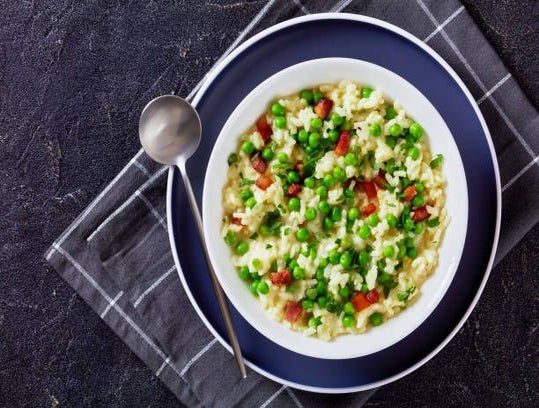 Plate of risotto alla primavera, featuring vibrant spring vegetables..jpg