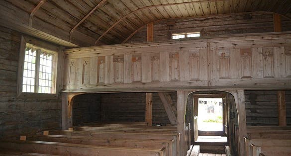 Photo of interior of old wooden church of Sodankylä village, Finland.