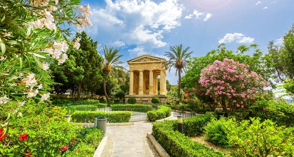 Photo of Lower Barrakka public garden and the monument to Alexander Ball in old town Valletta, capital of Malta.