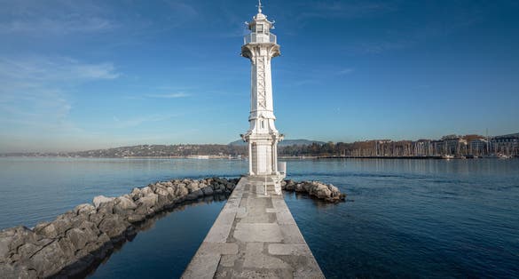 Photo of lighthouse Bains des Paquis Public Baths on Lake Geneva - Geneva, Switzerland.