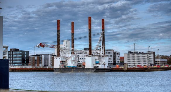 PHOTO OF VIEW OF mega jack-up installation ship, specialized ship visiting the city of Esbjerg, home port ship for special tasks, Esbjerg, Denmark.