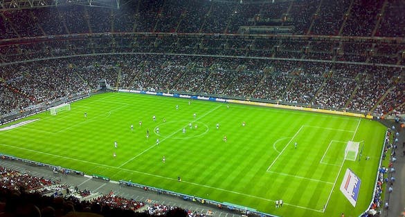 Photo of interior of Wembley Stadium that is a football stadium in Wembley, UK.