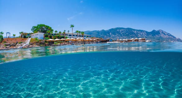 Photo of Camelot Beach in Kyrenia, North Cyprus on sunny day with clear sky.