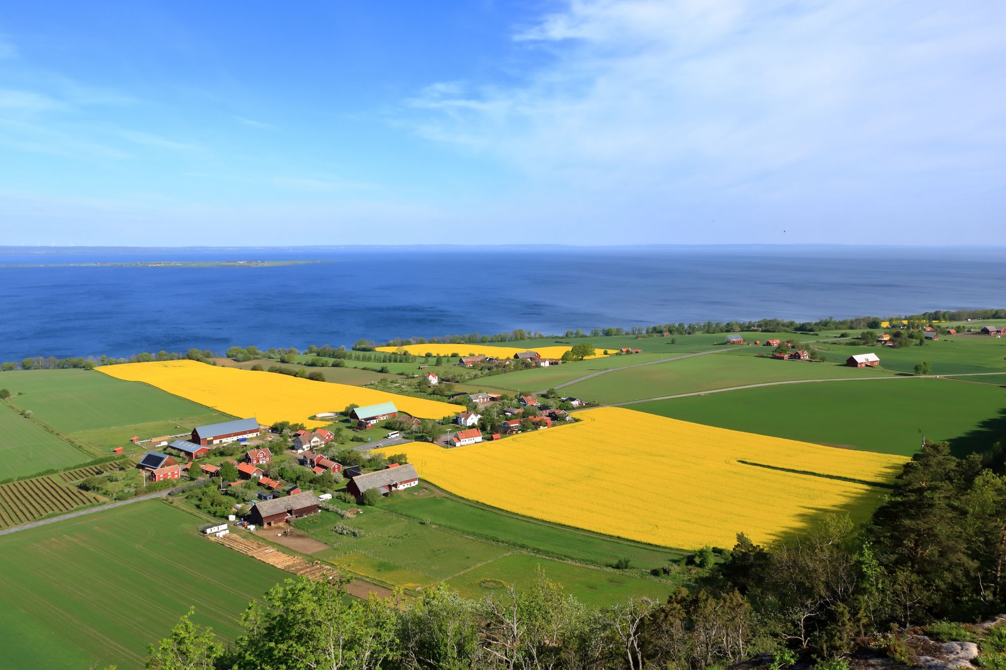 photo of Lake Vattern Area, high angle countryside view from Brahehus castle ruins in Sweden.