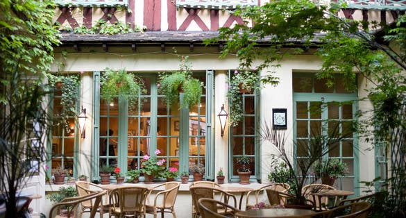 Photo of Rouen ,Court of ancient bar ,restaurant at evening, (Seine-Maritime, Haute-Normandie, France).