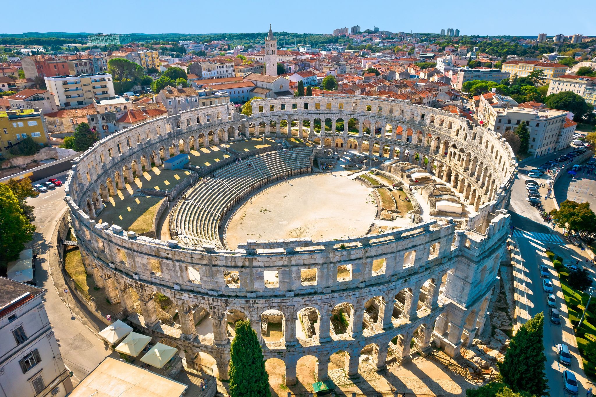Photo of Ancient ruins of Roman amphitheatre in Pula aerial view, Istria region of Croatia.