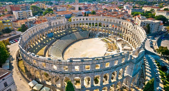 Photo of Ancient ruins of Roman amphitheatre in Pula aerial view, Istria region of Croatia.