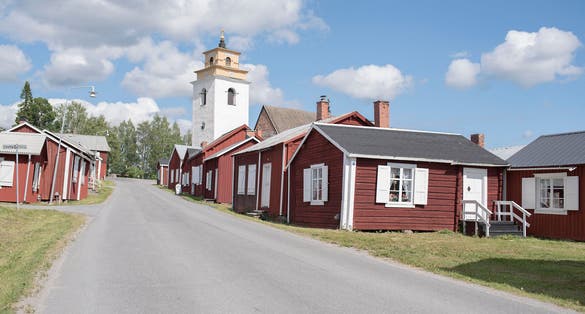 photo of sunny morning view of world Heritage Gammelstad Church Town in Luleå, Sweden.