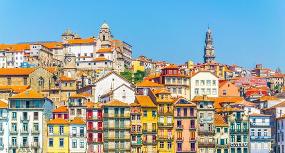 Photo of aerial view of porto dominated by torre dos clerigos tower, Portugal.