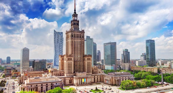 Photo of aerial view Palace of Culture and Science and downtown business skyscrapers, city center of Warsaw, Poland.