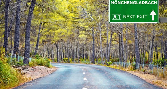 MONCHENGLADBACH road sign against clear blue sky