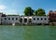 photo of the Grand Canal and the Peggy Guggenheim Collection. Clear blue skies and wonderful water in the canal. Perfect water trip for a tourist venice italy.