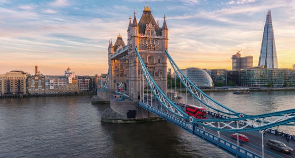 Photo of iconic Tower Bridge in London. One of London's most famous bridges and must-see landmarks on the Thames River.