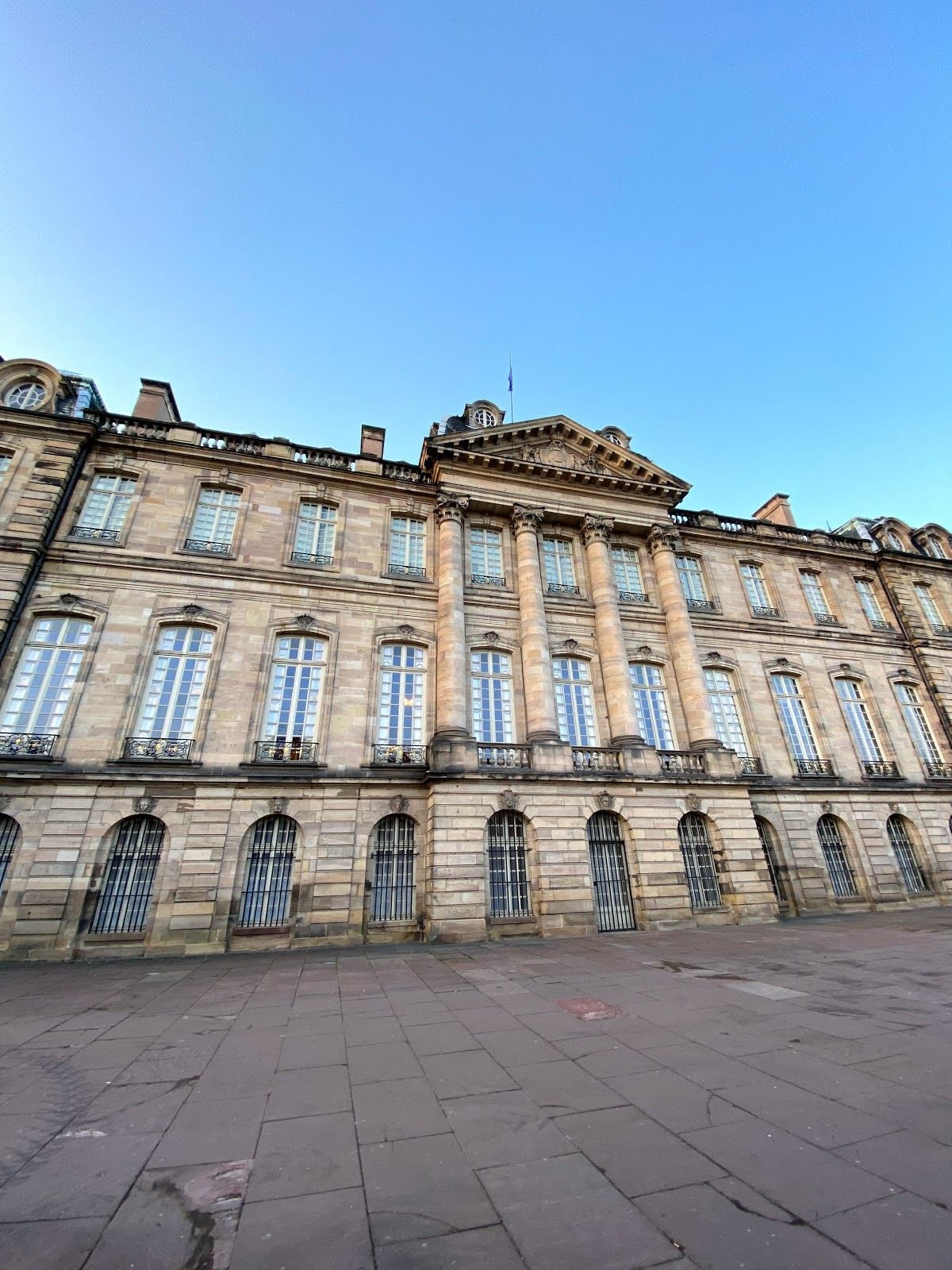 Photo of traditional half-timbered houses on picturesque canals in La Petite France in the medieval fairytale town of Strasbourg, France.