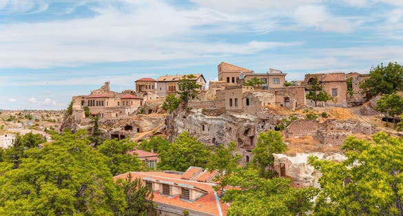 Photo of Magic fungous forms of sandstone in the canyon near Cavusin village, Cappadocia, Nevsehir Province.