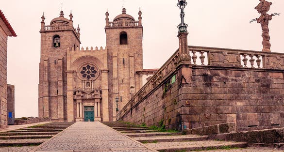 Photo of Porto Cathedral. Portugal. Beautiful morning view of the famous cathedral in Porto. Camino de Santiago. Pillory of Porto.