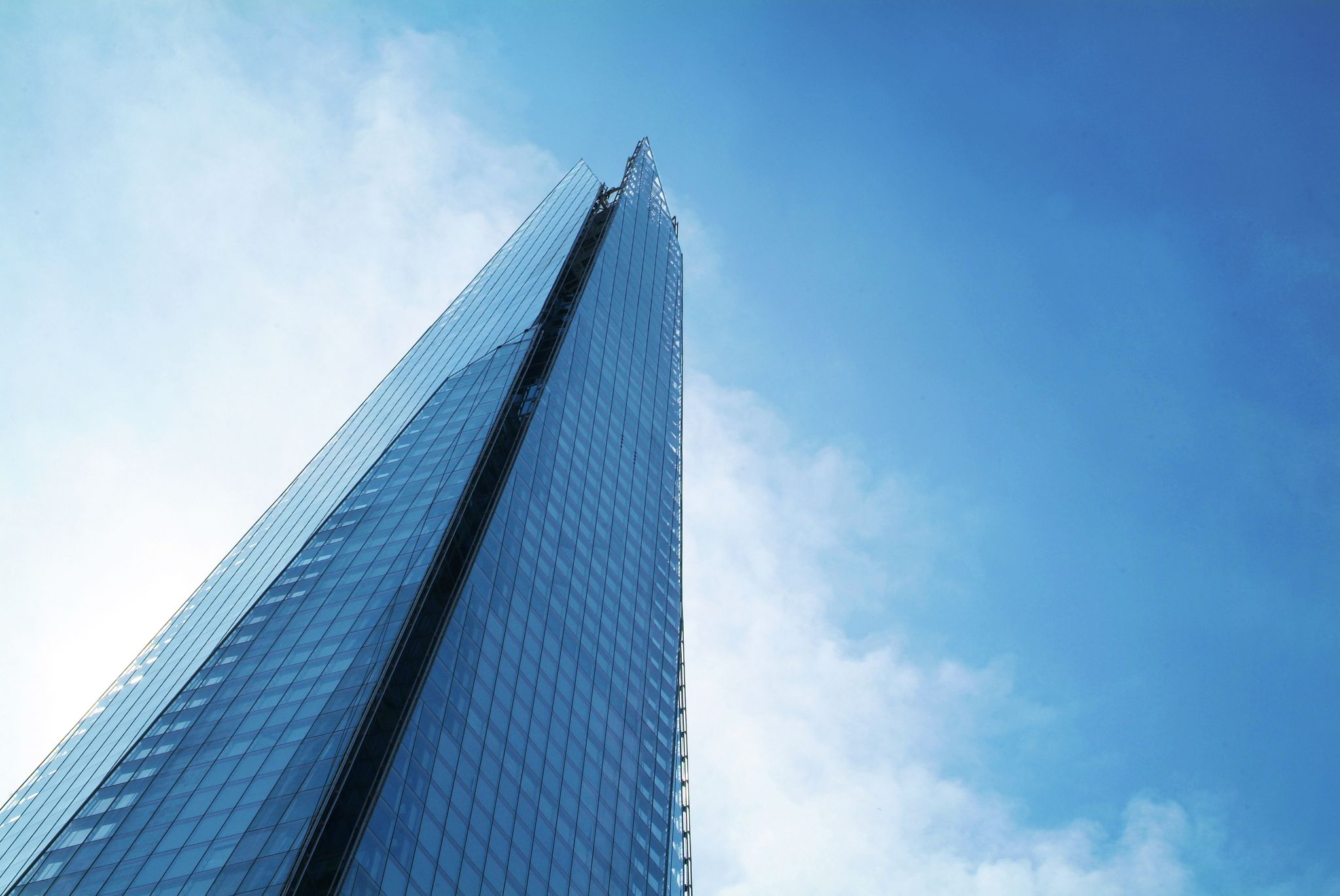 Photo of the Shard towering over London, photographed in London, UK.