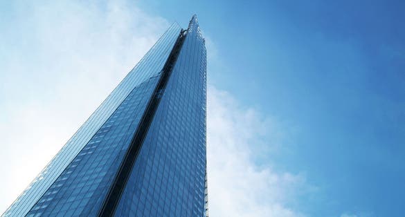 Photo of the Shard towering over London, photographed in London, UK.