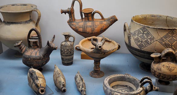 Photo of Archaeological finds and pottery, Ceramics and plates. Vases in Cyprus Museum.