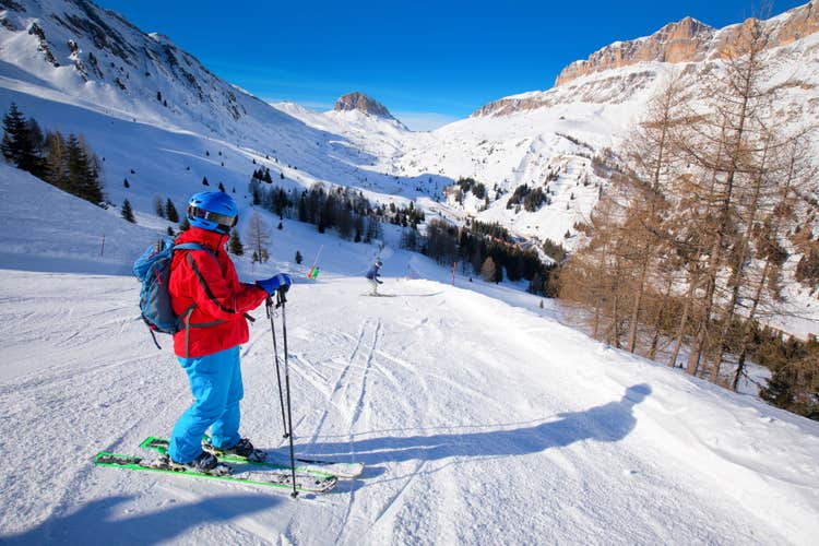 Photo of young man ready for skiing in Dolomity super ski resort, Italy, Europe.