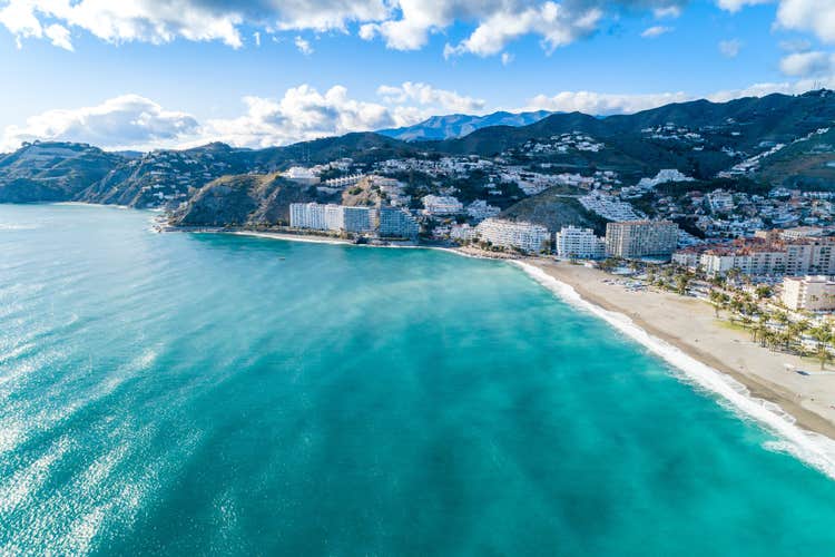 Photo of  aerial view of a mediterranean spanish beach (San Cristobal beach) at Almunecar, Granada, Spain.
