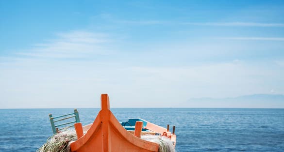 Photo of fishing boat on the beach in Alexandroupolis, Greece.