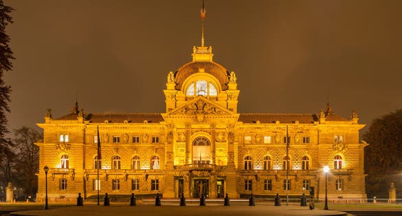 photo of Palais du Rhin at night in Strasbourg, France.