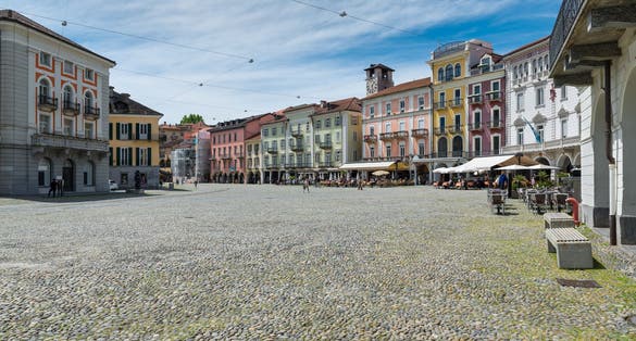 photo of Locarno, Switzerland, square Grande (piazza Grande) with shops and restaurants located in the historic center of the city.