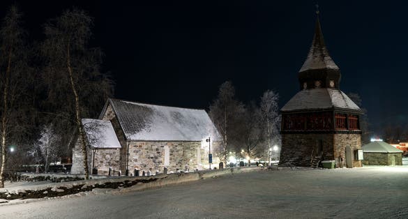 photo of Åre Old Church in winter at night. Åre, Sweden.