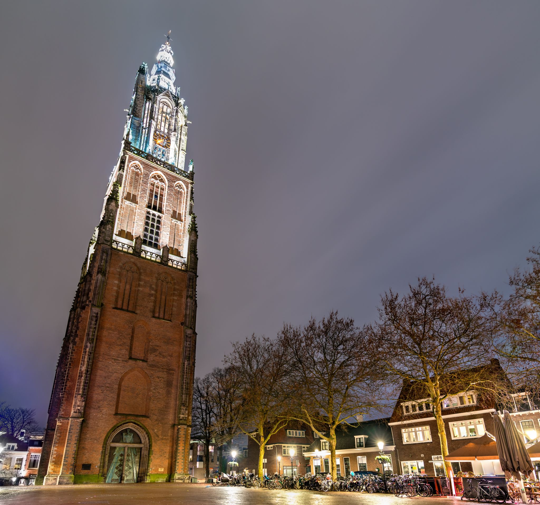 photo of night view of The Onze-Lieve-Vrouwetoren, the Tower of Our Lady in Amersfoort, The Netherlands.