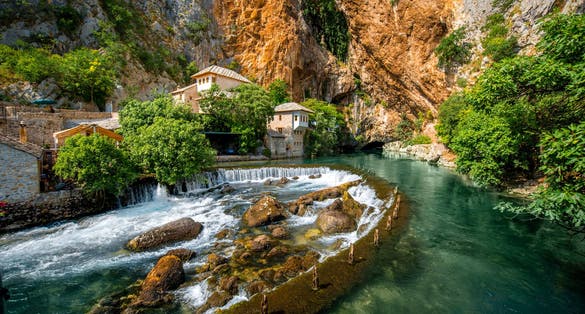 Photo of small village Blagaj on Vrelo Bune spring and waterfall in Bosnia and Herzegovina.