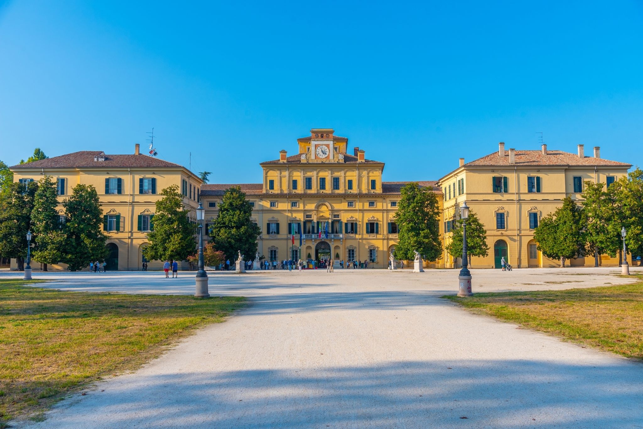 Photo of panorama of Parma cathedral with Baptistery leaning tower on the central square in Parma town in Italy.