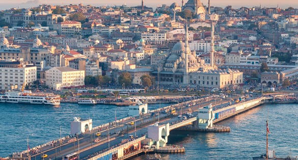 Beautiful sunset aerial cityscape of Istanbul historic centre with Galata bridge and mosques. Istanbul, Turkey.