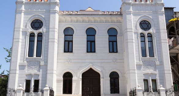Photo of Snow-white building of the synagogue in Batumi, Republic of Georgia.
