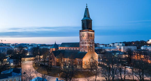 Photo of aerial view of Turku at night, Finland.