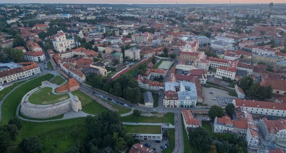 Vilnius Old Town with Sunset Light in Background. Lithuania.