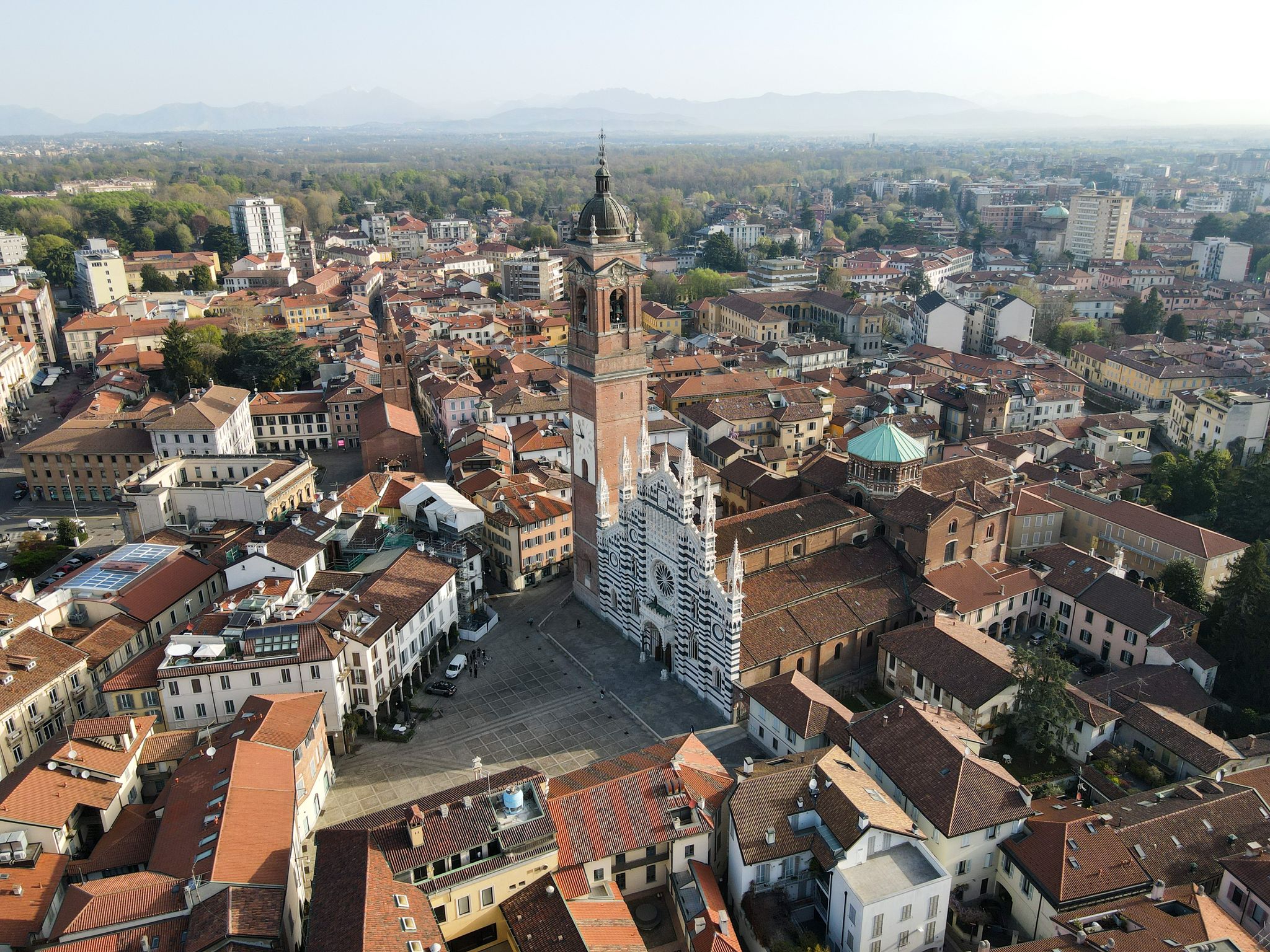 Aerial view of facade of the ancient Duomo in Monza (Monza Cathedral). Drone photography of the main square with church in Monza in north Italy, Brianza, Lombardia.