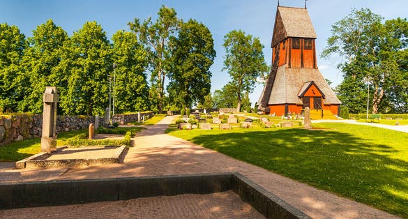photo of old church in the historic Old Uppsala archaeological area in Gamla Uppsala, Sweden.