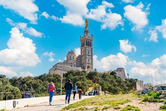 Tourists walking towards the Basilique Notre-Dame de la Garde.jpg