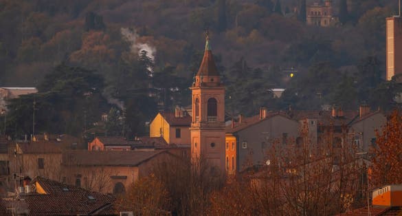 photo of Bologna capital of the Emilia Romagna region urban architecture images historical buildings two towers Maggiore square San Petriono basilica .