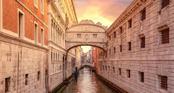 photo of view of famous Bridge of Sighs (Ponte dei Sospiri) in Venice, Italy .
