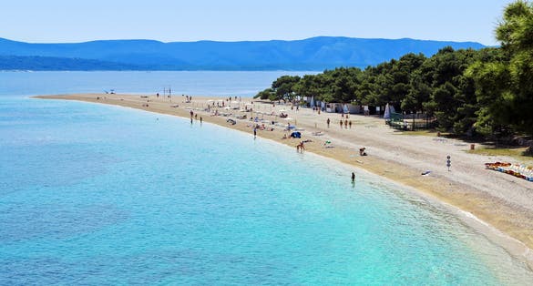 Photo of Zlatni Rat (Golden Cape) is a popular beach in the Town Bol which is on the south of the island of Brac in the Split-Dalmatia County of Croatia.