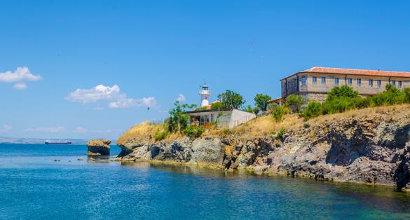 photo of view of small island of saint anastasia is a new tourist attraction in bulgaria near burgas. reconstructed museum, hotel, restaurant and lighthouse are accompanied by small cute beach.,Burgas Bulgaria.
