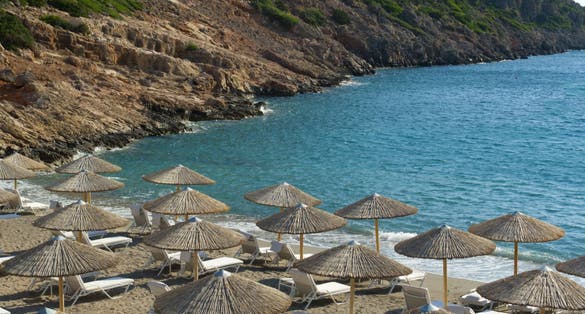 Photo of beach of Agios Nikolaos by morning , Crete, Greece.