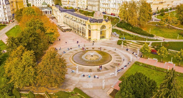Photo of aerial view of main colonnade with singing fountain main attraction of Marianske Lazne (Marienbad), Czech Republic.