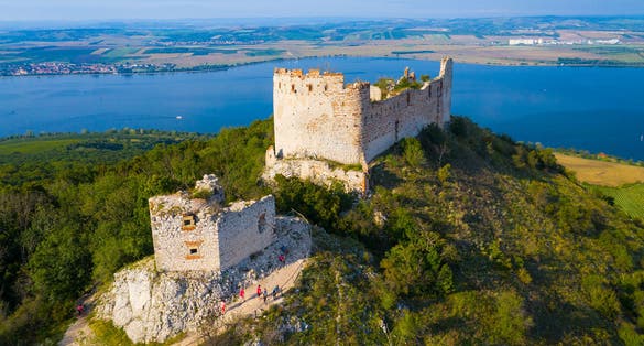 Photo of the Devicky castle on Pavlov hills in Palava nature reserve near Nove Mlyny reservoir, famous landmark on South Moravia, Czech Republic